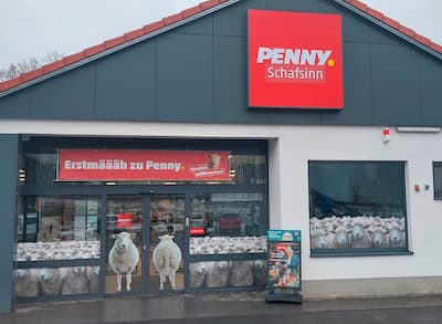 Sie sehen den Eingang vom Penny Markt in Burgsinn Im Unterreith 1