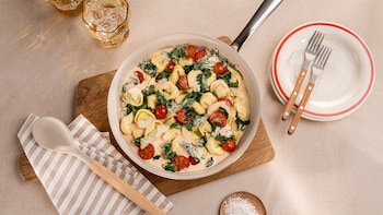 Tortellini mit Spinat und Tomaten