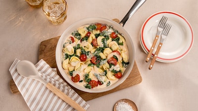 Tortellini mit Spinat und Tomaten