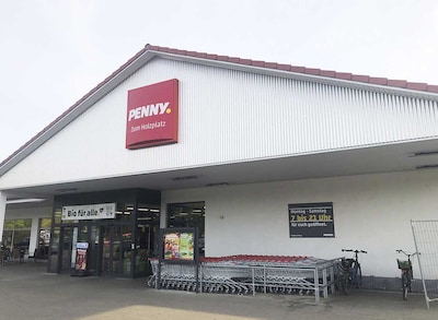 Sie sehen den Eingang vom Penny Markt in Sassenburg, Zum Holzplatz 2