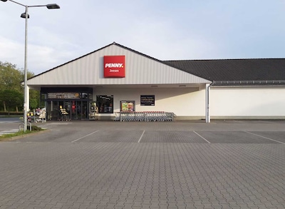 Sie sehen den Eingang vom Penny Markt in Koenigs Wusterhausen Karl-Liebknecht-Str. 159 a-c