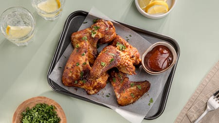 Dieses Bild zeigt die fertigen Hähnchenflügel.