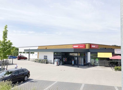 Sie sehen den Eingang vom Penny Markt in Lobbach Neurott 48 + 50