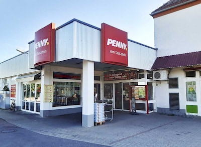 Sie sehen den Eingang vom Penny Markt in Taura B Burgstaedt Mittweidaer Str. 56