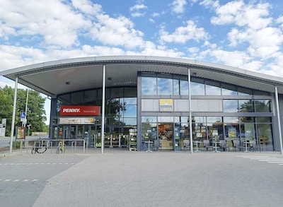 Sie sehen den Eingang vom Penny Markt in Ginsheim-Gustavsburg, Am alten Fährhaus 1