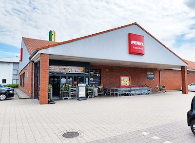 sie sehen den Eingang vom Penny Markt in Trappenkamp Erfurter Str. 4-8