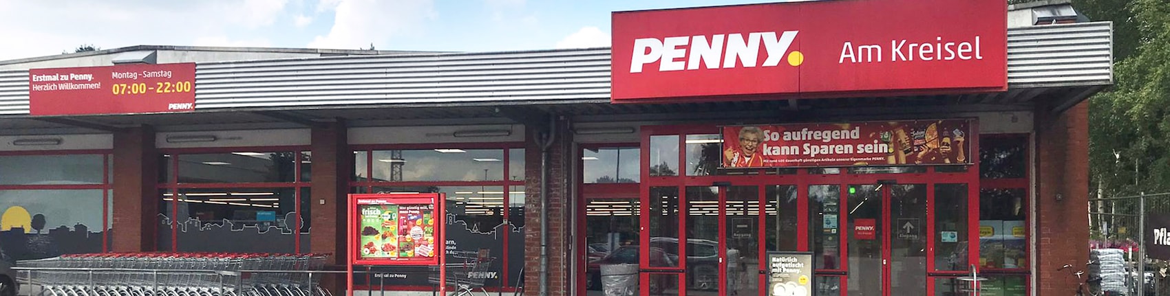 Sie sehen den Eingang vom Penny Markt in Glinde, Berliner Str. 2
