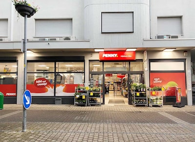 Sie sehen den Eingang vom Penny Markt in Muehlheim, Bahnhofstr. 10