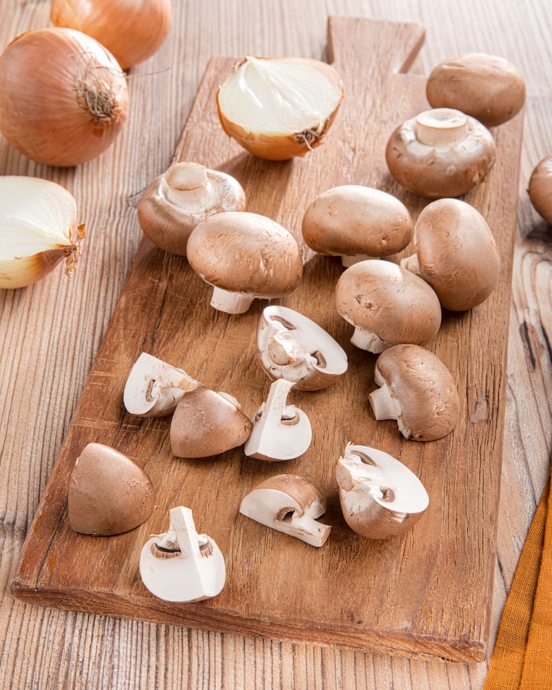 Dieses Bild zeigt geschnittene Champignons.