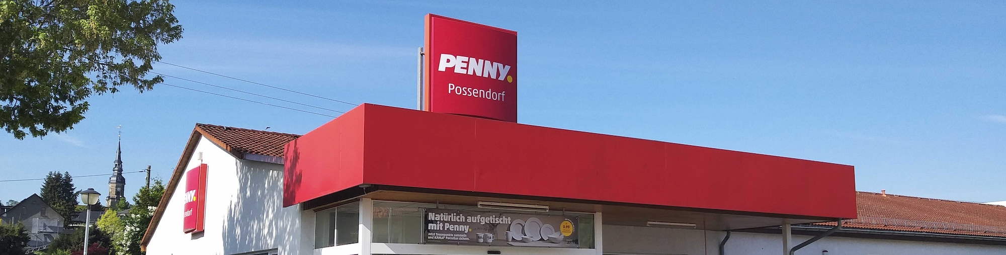 Sie sehen den Eingang vom Penny Markt in Possendorf Kreischaer Str. 2B
