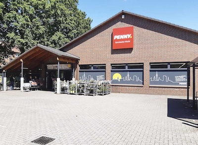 Sie sehen den Eingang vom Penny Markt in Hamburg, Hufnerstr. 4C