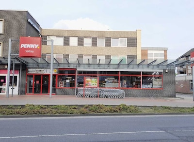 Sie sehen den Eingang vom Penny Markt in Soltau, Celler Str. 6