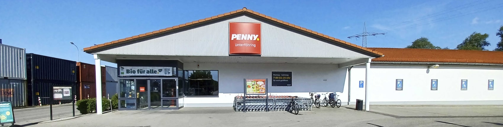 Sie sehen den Eingang vom Penny Markt in Unterföhring Wilhelm-Kemmelmeyer-Bogen 7