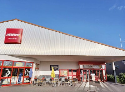 Sie sehen den Eingang vom Penny Markt in Hettenleidelheim, Wattenheimer Str. 34