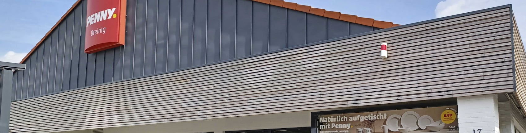 Sie sehen den Eingang vom Penny Markt in Stolberg/Breining Stockemer Str. 17-19