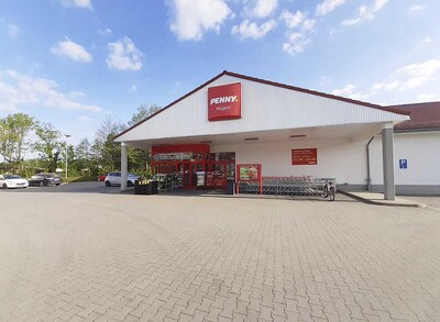 Sie sehen den Eingang vom Penny Markt in Muegeln Franz-Mehring-Str 16b
