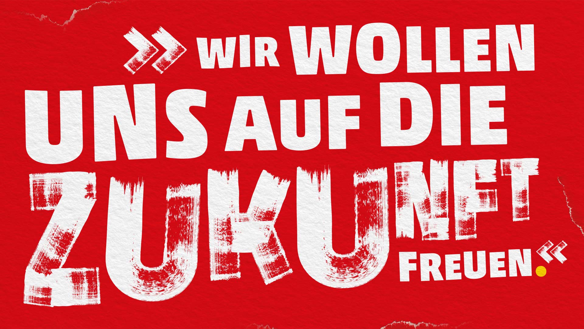 Ein Zitat in weißer Schrift auf rotem Hintergrund: Wir wollen uns auf die Zukunft freuen.