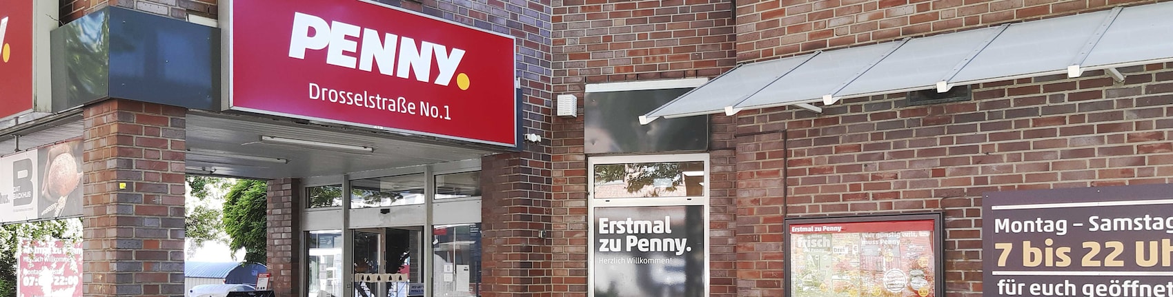 Sie sehen den Eingang vom Penny Markt in Hamburg, Drosselstraße 1