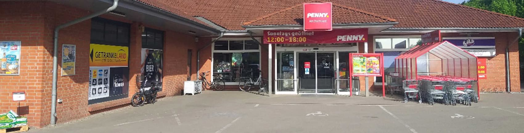 Sie sehen den Eingang vom Penny Markt in Kuehlungsborn, Neue Reihe 94