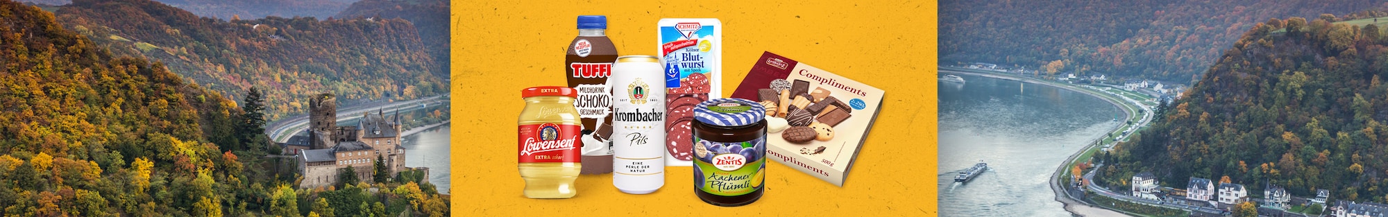 Eine Range mit regionalen Produkten aus Nordrhein-Westfalen, zum Beispiel Blutwurst, Senf und Pflaumenmarmelade, vor einem Foto von einer Flusslandschaft in Nordrhein-Westfalen