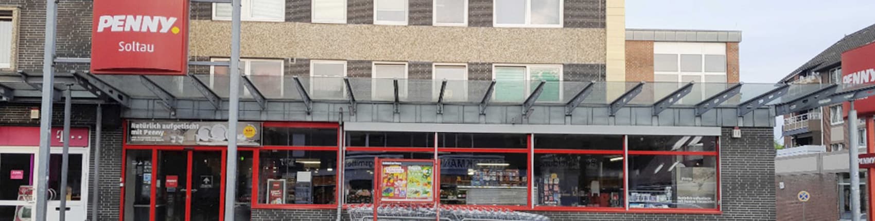 Sie sehen den Eingang vom Penny Markt in Soltau, Celler Str. 6
