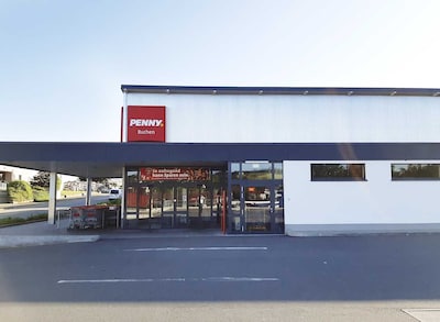 Sie sehen den Eingang vom Penny Markt in Buchen Zu den Dilläckern 2