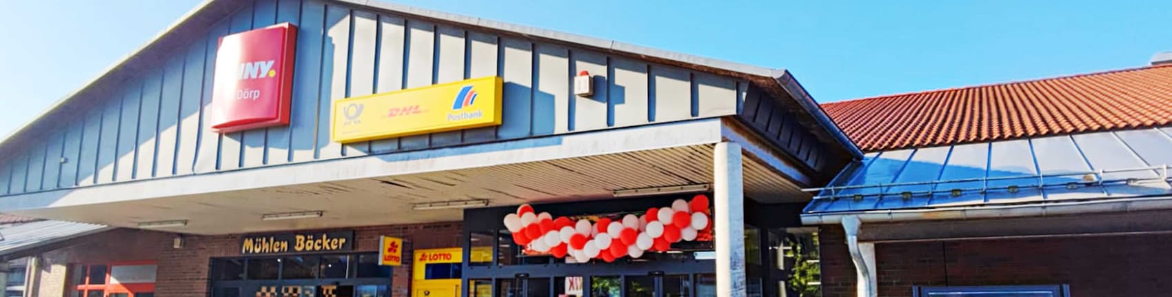 sie sehen den Eingang vom Penny Markt in Albersdorf Friedrichstr. 1-3