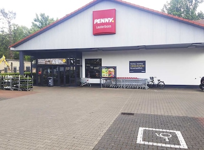 Sie sehen den Eingang vom Penny Markt in Offenbach Am Main, Schumannstr. 56
