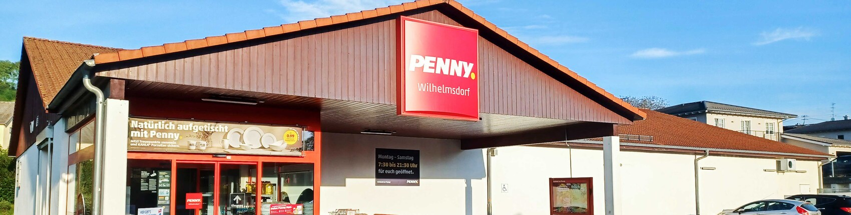 Sie sehen den Eingang vom Penny Markt in Wilhelmsdorf Welfenstr. 6