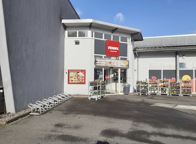 Sie sehen den Eingang vom Penny Markt in Minden, Lahder Str. 19-21