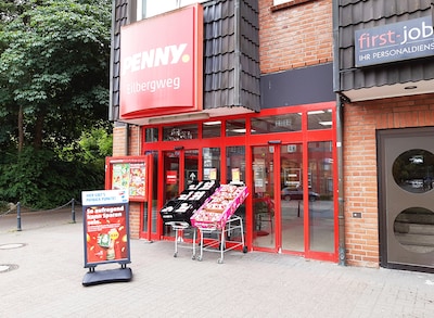 Sie sehen den Eingang vom Penny Markt in Grosshansdorf, Eilbergweg 16