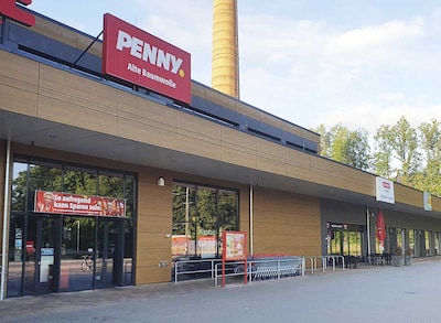 Sie sehen den Eingang vom Penny Markt in Flöha, Seeberstraße 1