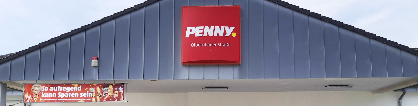 Sie sehen den Eingang vom Penny Markt in Freiberg Olbernhauer Str. 70