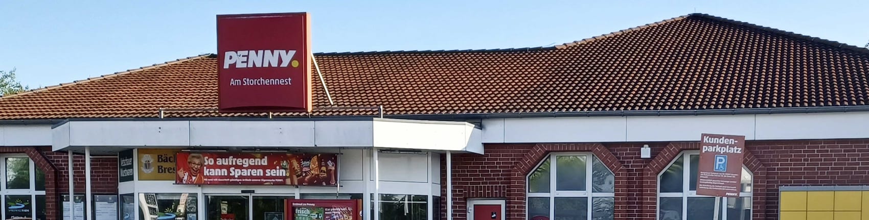 Sie sehen den Eingang vom Penny Markt in Schwarzkollm Sandwäsche 1