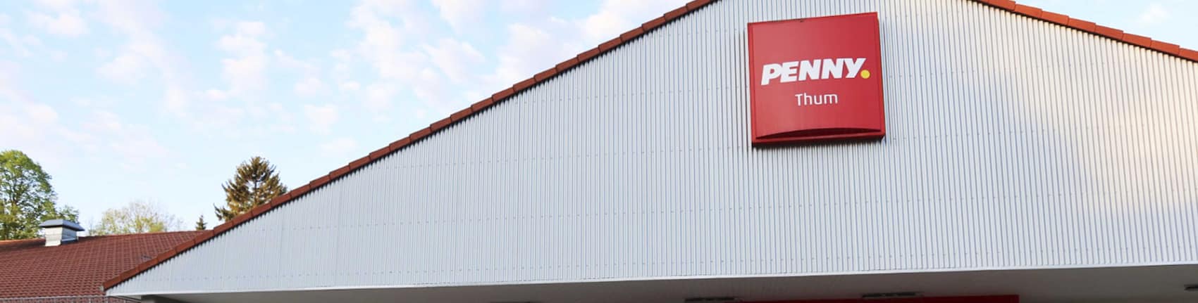 Sie sehen den Eingang vom Penny Markt in Thum Chemnitzer Strasse 63