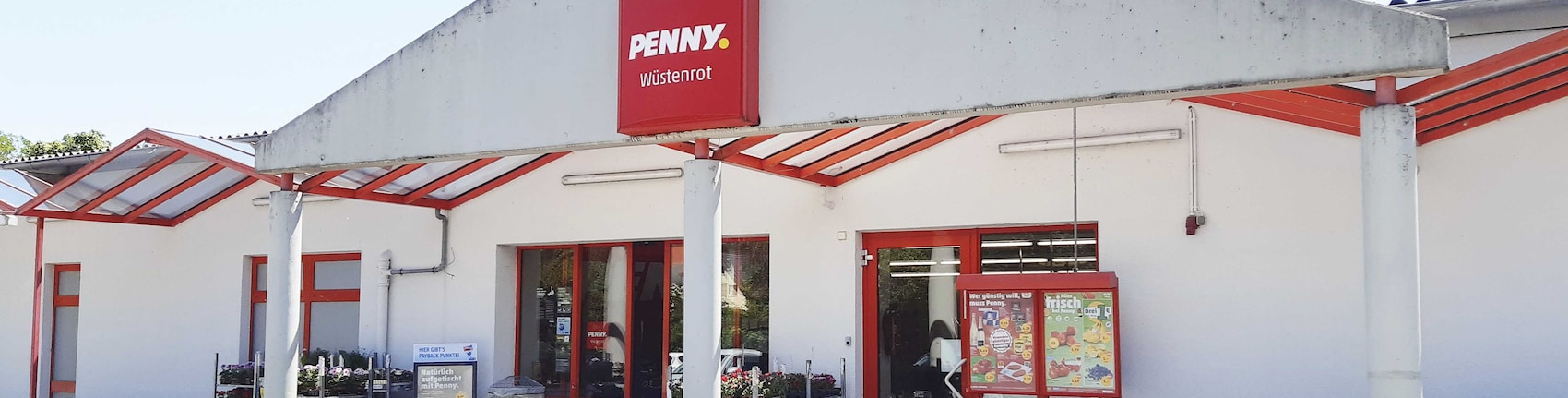 Sie sehen den Eingang vom Penny Markt in Wüstenrot Löwensteiner Str. 19