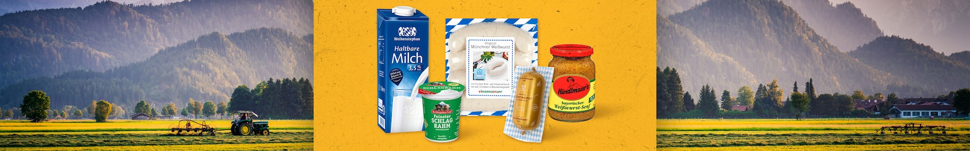 Eine Range mit regionalen Produkten aus Bayern, zum Beispiel Weißwürste, Süßer Senf und Schlag Rahm, vor einem Foto einer Voralpenlandschaft in Bayern. 