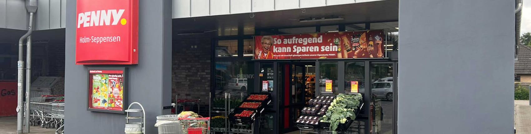 Sie sehen den Eingang vom Penny Markt in Holm-Seppensen, Niedersachsenweg 3-5