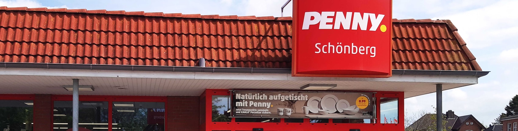 Sie sehen den Eingang vom Penny Markt in Schoenberg Kuhlenkamp 2A