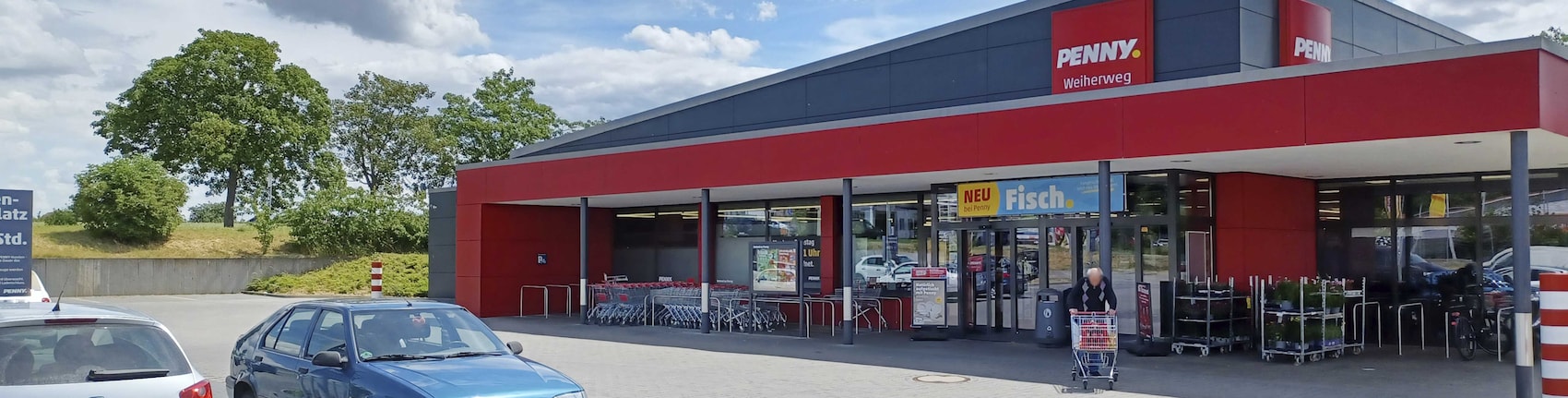 Sie sehen den Eingang vom Penny Markt in Oberhausen-Rheinhausen Weiherweg 6a