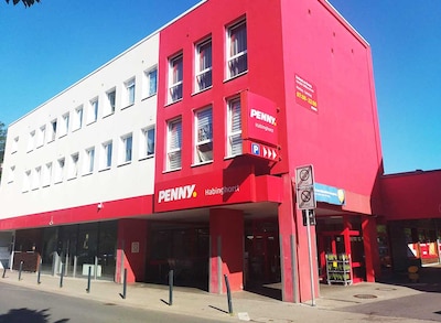 Sie sehen den Eingang vom Penny Markt in Castrop-Rauxel - Habinghorst, Lange Strasse 95-97
