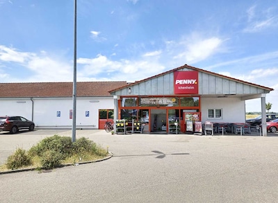 Sie sehen den Eingang vom Penny Markt in Neuried/Ichenheim, Hauptstr. 105