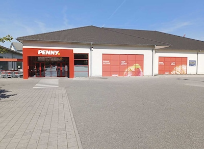 Sie sehen den Eingang vom Penny Markt in Weingarten (Baden), Durlacher Str. 84