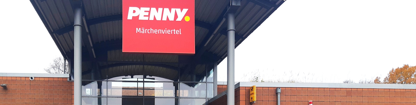 Sie sehen den Eingang vom Penny Markt in Lübeck, Andersenring 30