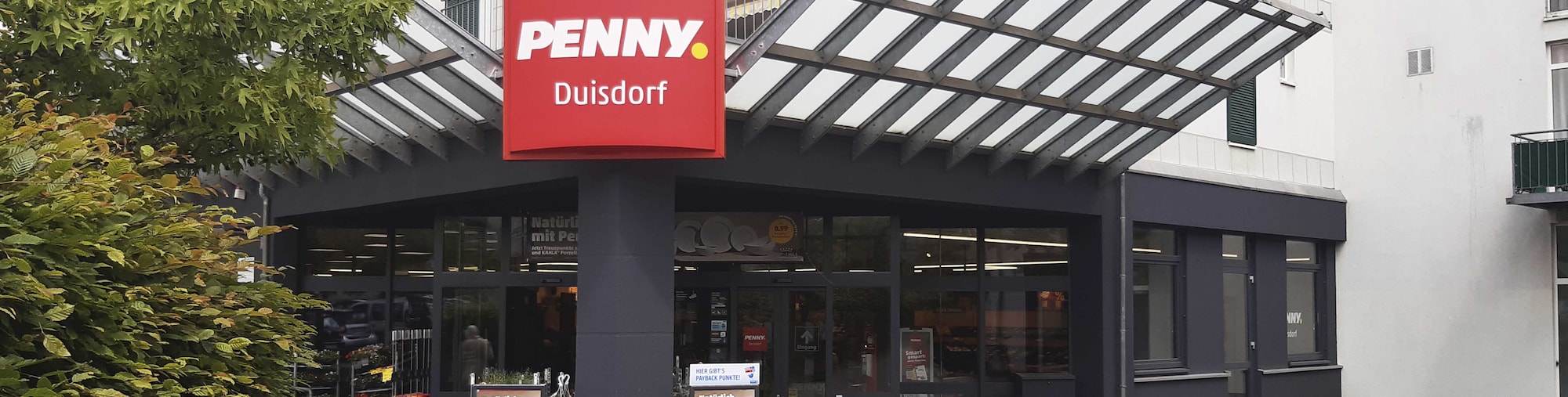 Sie sehen den Eingang vom Penny Markt in Bonn – Duisdorf Bahnhofstr. 26