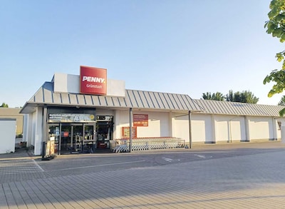Sie sehen den Eingang vom Penny Markt in Gruenstadt, Kirchheimer Str. 70