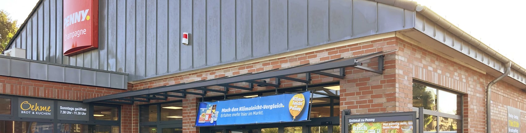 sie sehen den Eingang vom Penny Markt in Mettmann Champagne 16