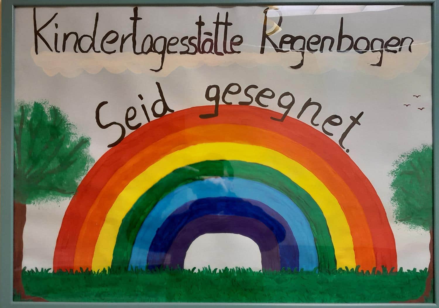 Selbstgemaltes Bild von einem Regenbogen