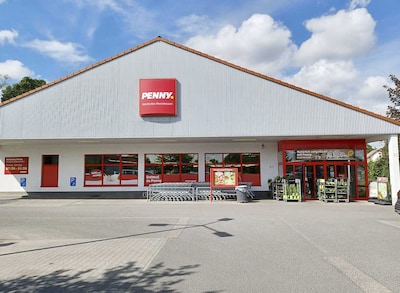 Sie sehen den Eingang vom Penny Markt in Westhofen, Römergrund 1