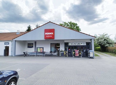 Sie sehen den Eingang vom Penny Markt in Isenbüttel, Hauptstr. 11
